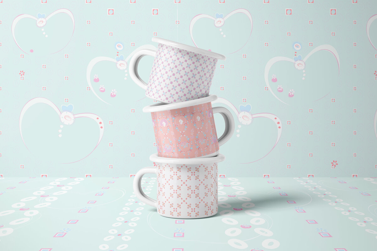 pink and white patterned coffee mugs
