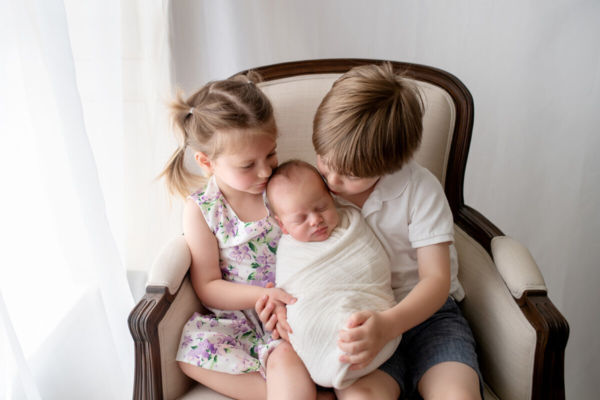 Newborn session with older brother and sister