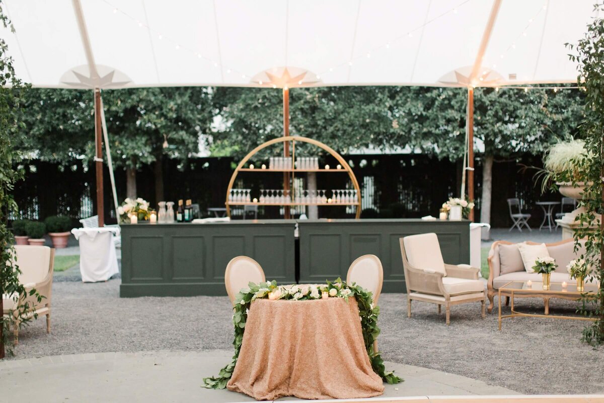 gold and green sweetheart table