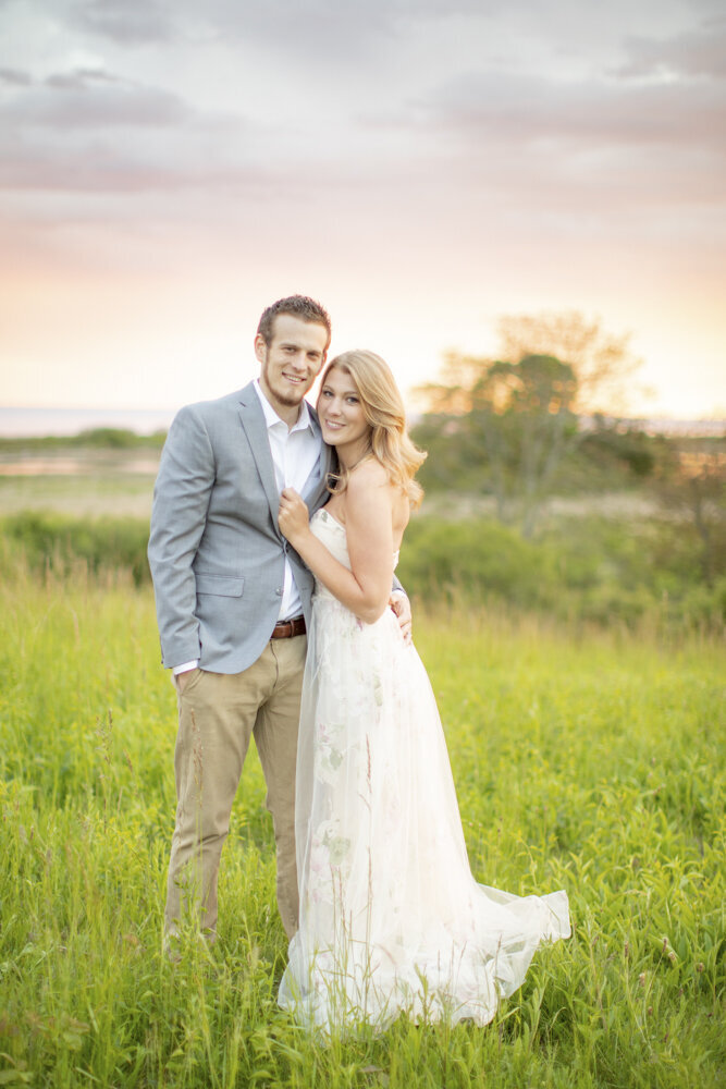 sunset portraits of engaged couple at Rhode Island
