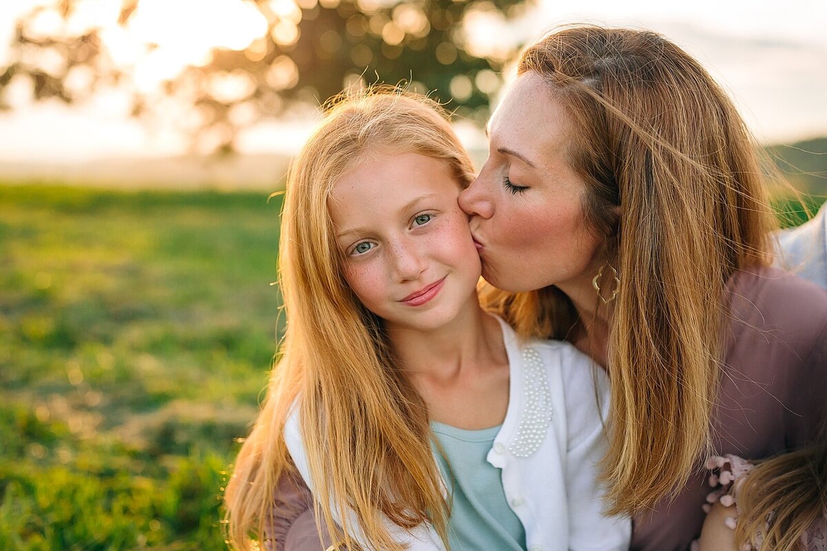 Mom kissing daughter's cheek Be Thou My Vision Photography