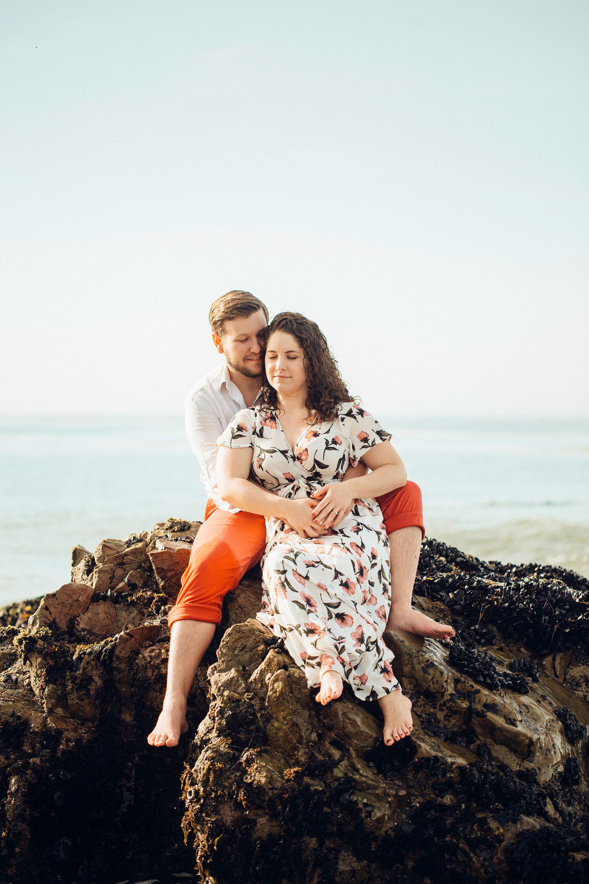 Engagement Photograph Of a Couple Seated On a Rock Formation Los Angeles