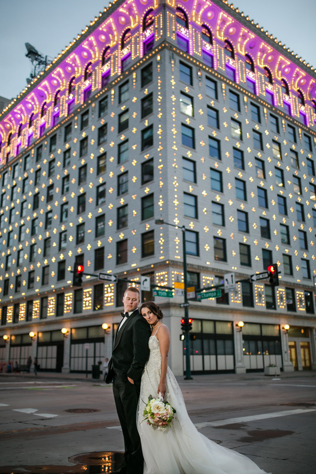 gas and electric building with bride and groom