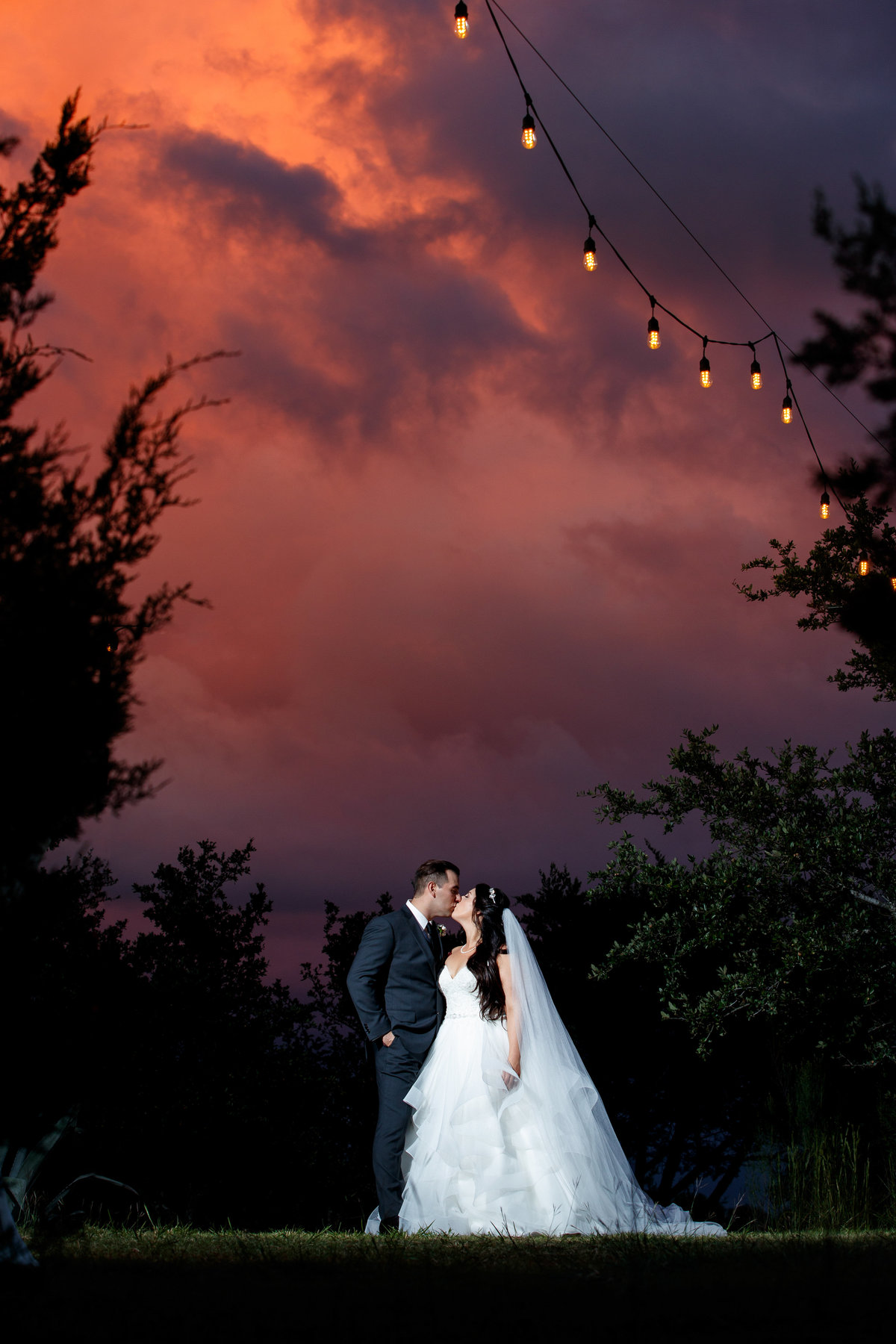 terrace club wedding photographer amazing sunset bride groom kiss 2600 US-290, Dripping Springs, TX 78620
