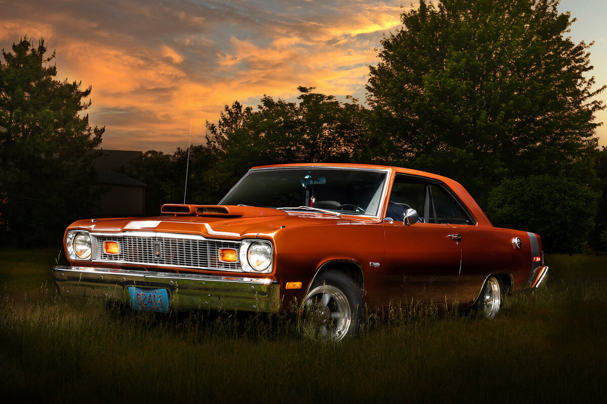 An automotive portrait of an orange Plymouth Scamp captured in Waukesha, WI using light painting.