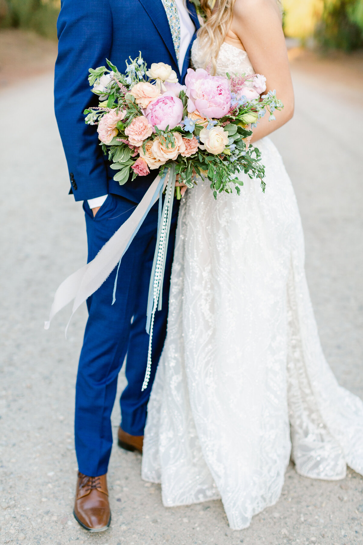 This pastel color palette for a floral bouquet highlights peonies.