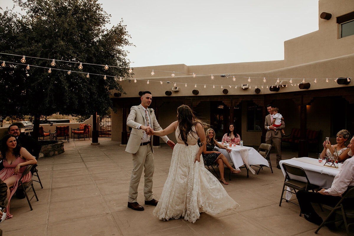 bride and groom first dance at their new mexico venue