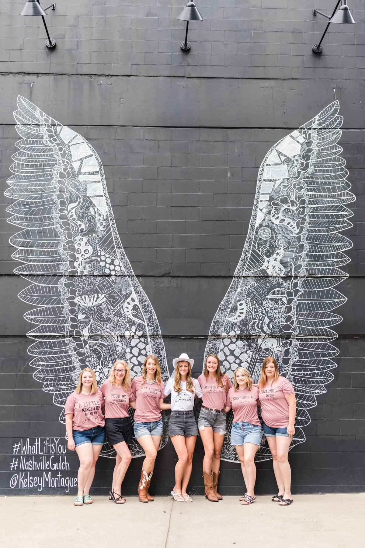 Nashville-Bachelorette-Photos-with-What-Lifts-You-Wings-Mural-in-the-Gulch+2