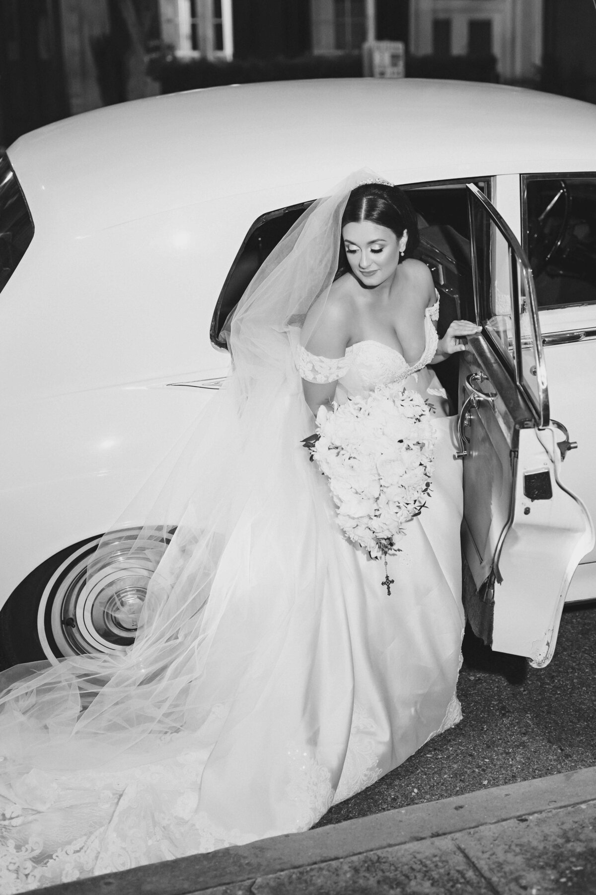 bride exiting classic car
