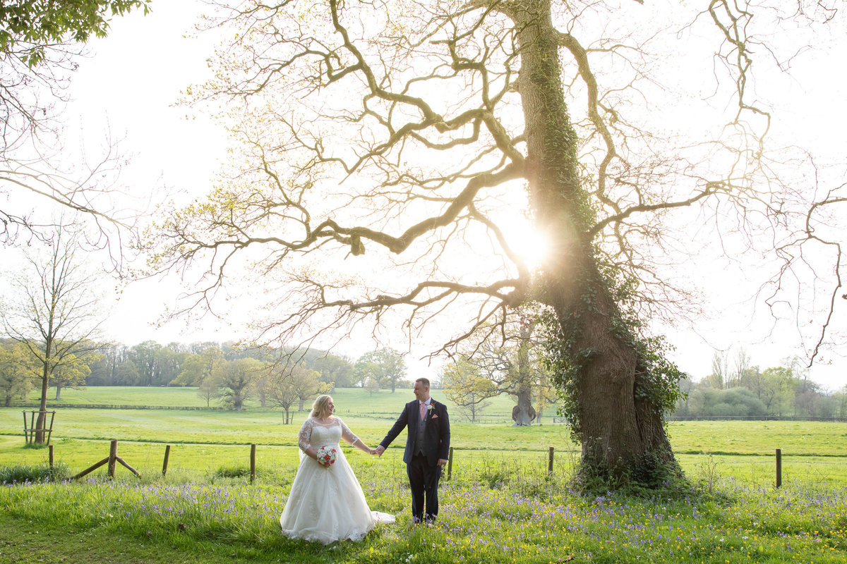 Wedding photo of couple in grounds of Rockbeare Manor Exeter Devon_