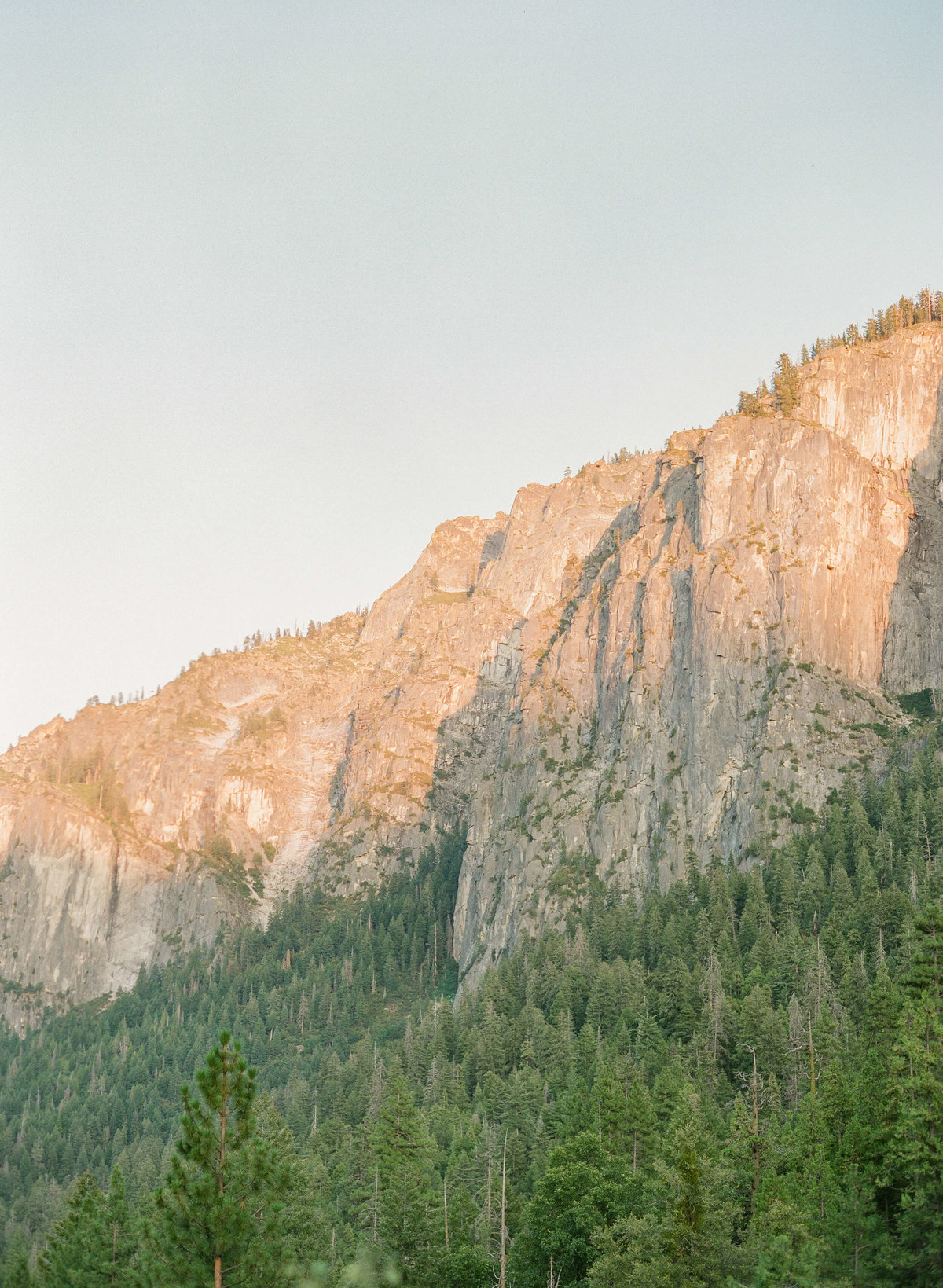 6-KTMerry-destination-engagement-photography-Yosemite-cliffside