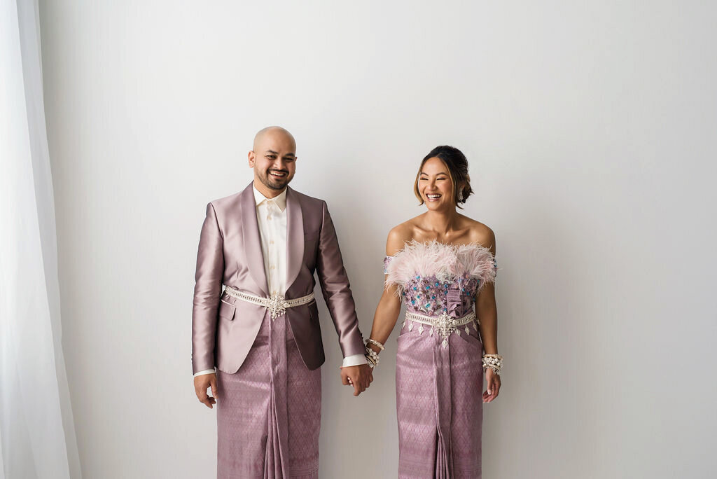 traditional khmer engagement session at seamless photography studio. fashionable asian couple for studio session.