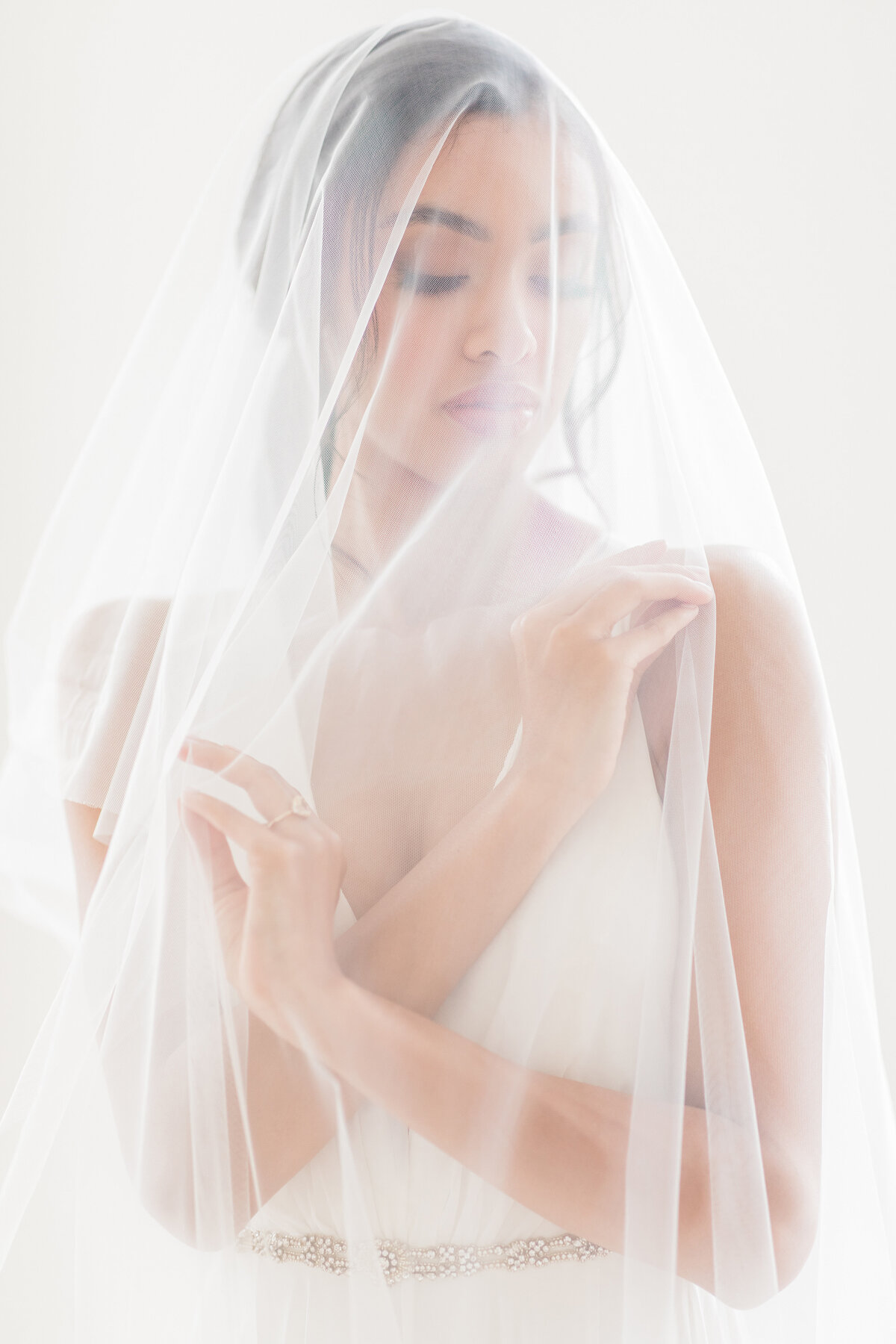 Bride under veil at The Creative Chateau