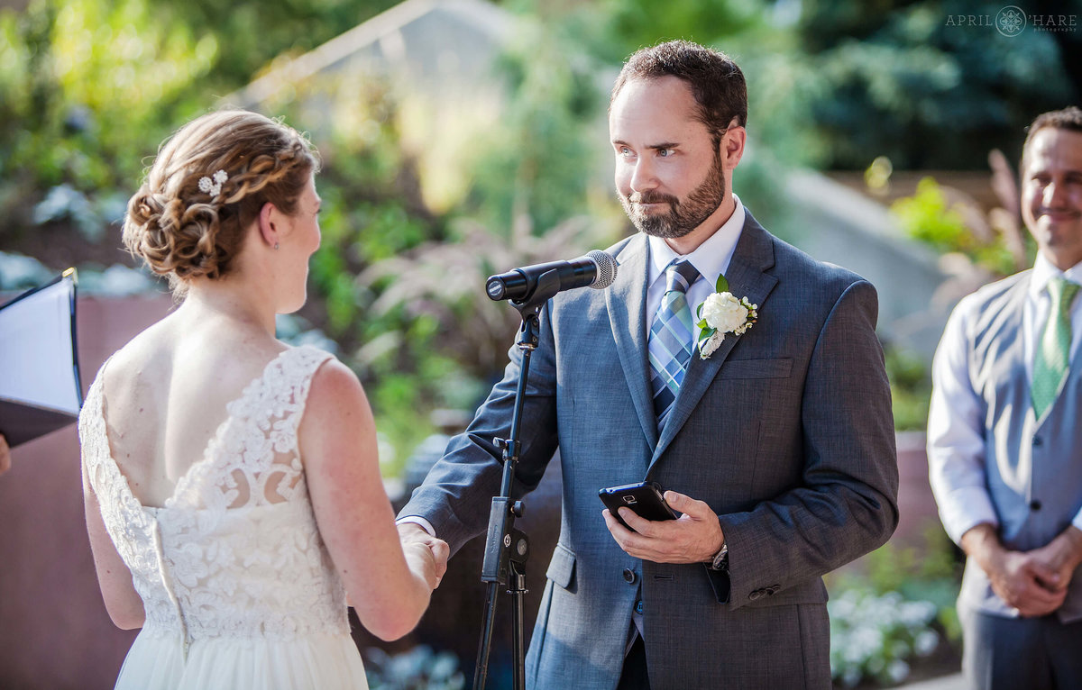 Wedding vows on a bright sunny wedding day at Denver Botanic Gardens All America Selections garden