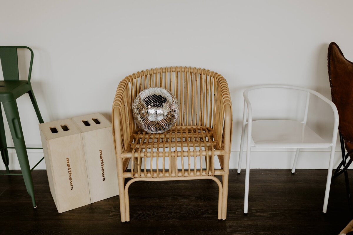rattan chair with a disco ball