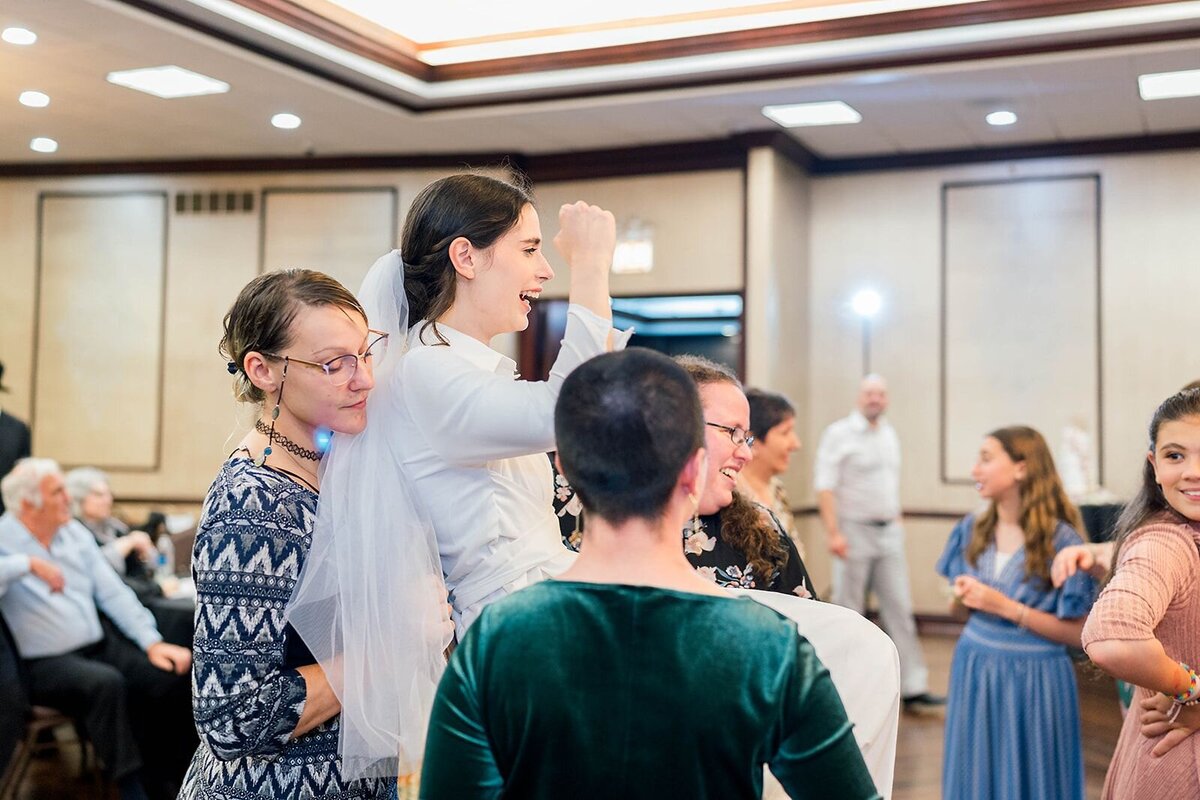 Eliana-Melmed-Photography-Chicago-LosAngeles-Jewish-WeddingPhotographer-CarmiKalman-WomensDancing-00130