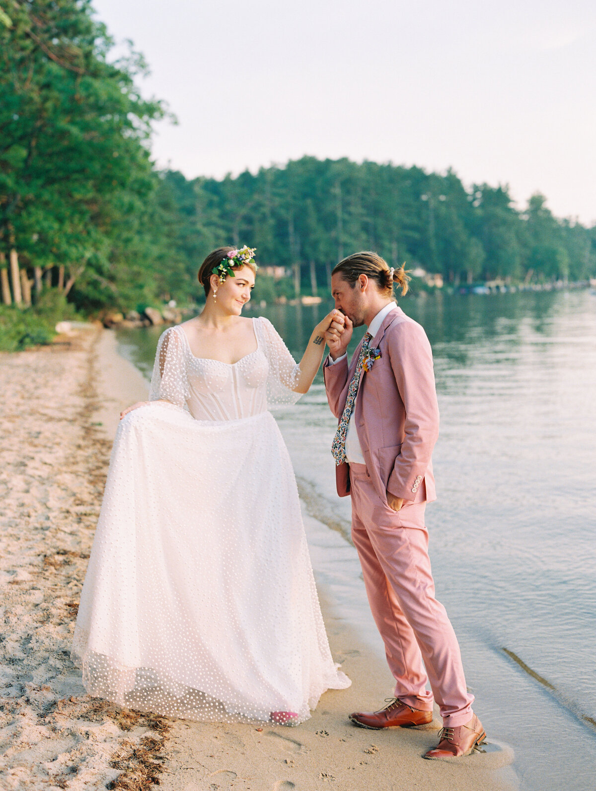 Bride and groom on the shore for Lake Winnipesaukee wedding