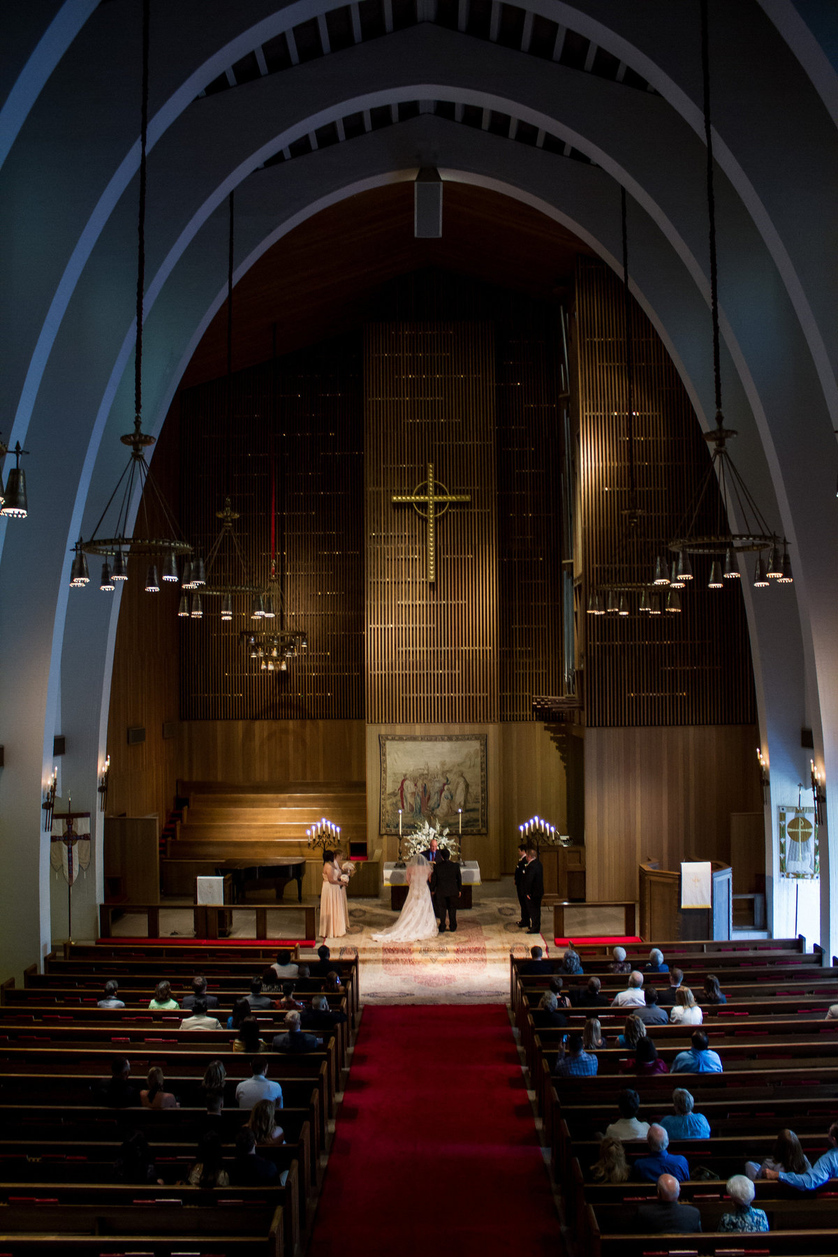 bride and groom at altar wedding ceremony at Margarite B. Parker Chapel at Trinity University