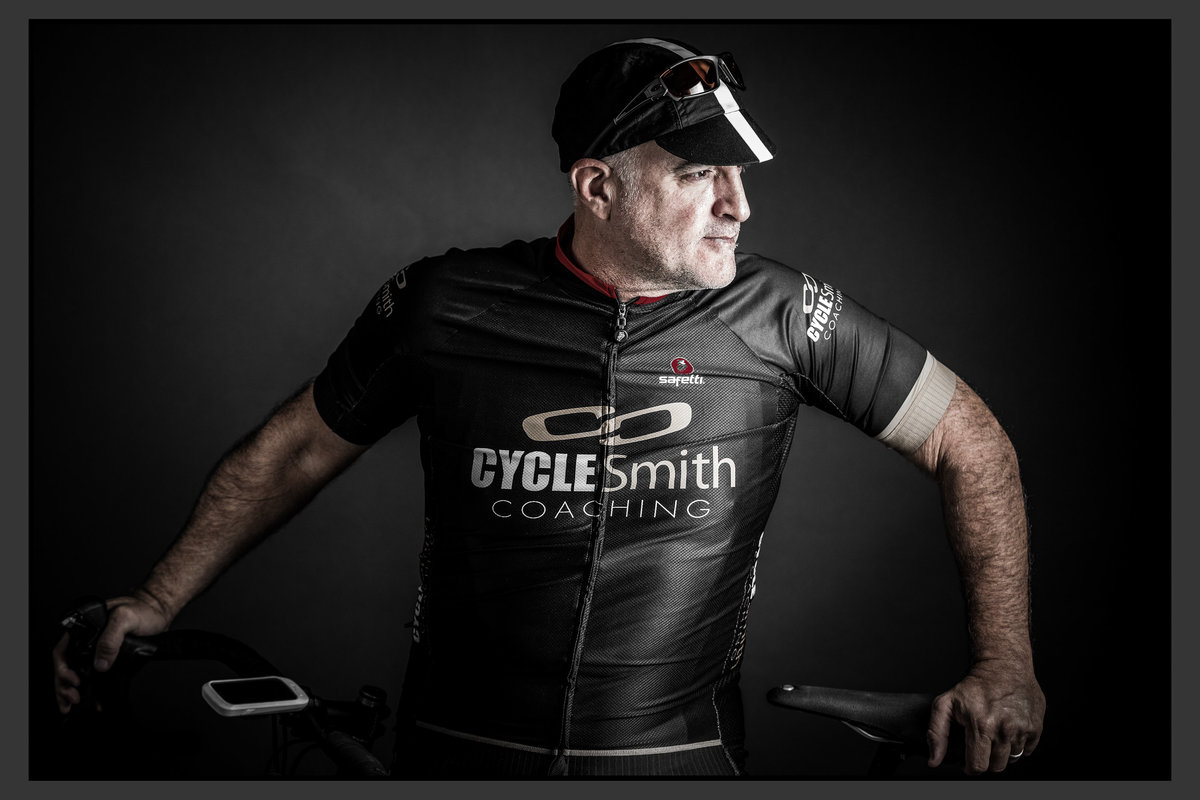 Derrick Birdsall in full Cycling Gear with Bike portrait