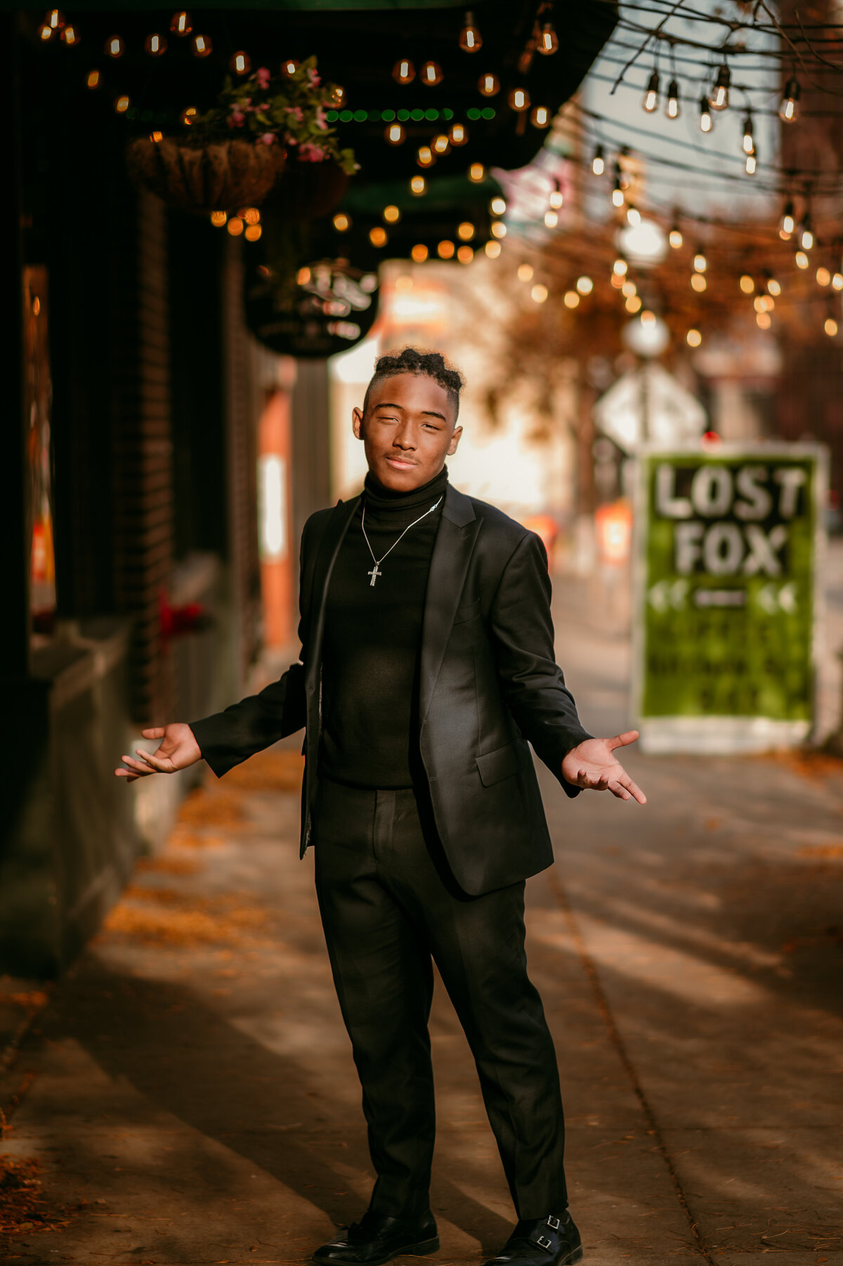 Embark on a visual journey through the elegance of a senior session featuring a half-Black, half-Hmong young man from North Saint Paul. Celebrate the beauty of dual heritage in St. Paul, MN
