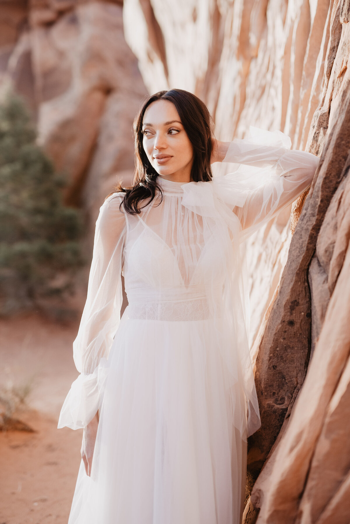 Utah elopement photographer captures bride wearing long sleeve wedding dress