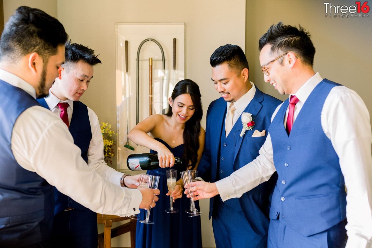 The Groom and his party share a pre-wedding drink together