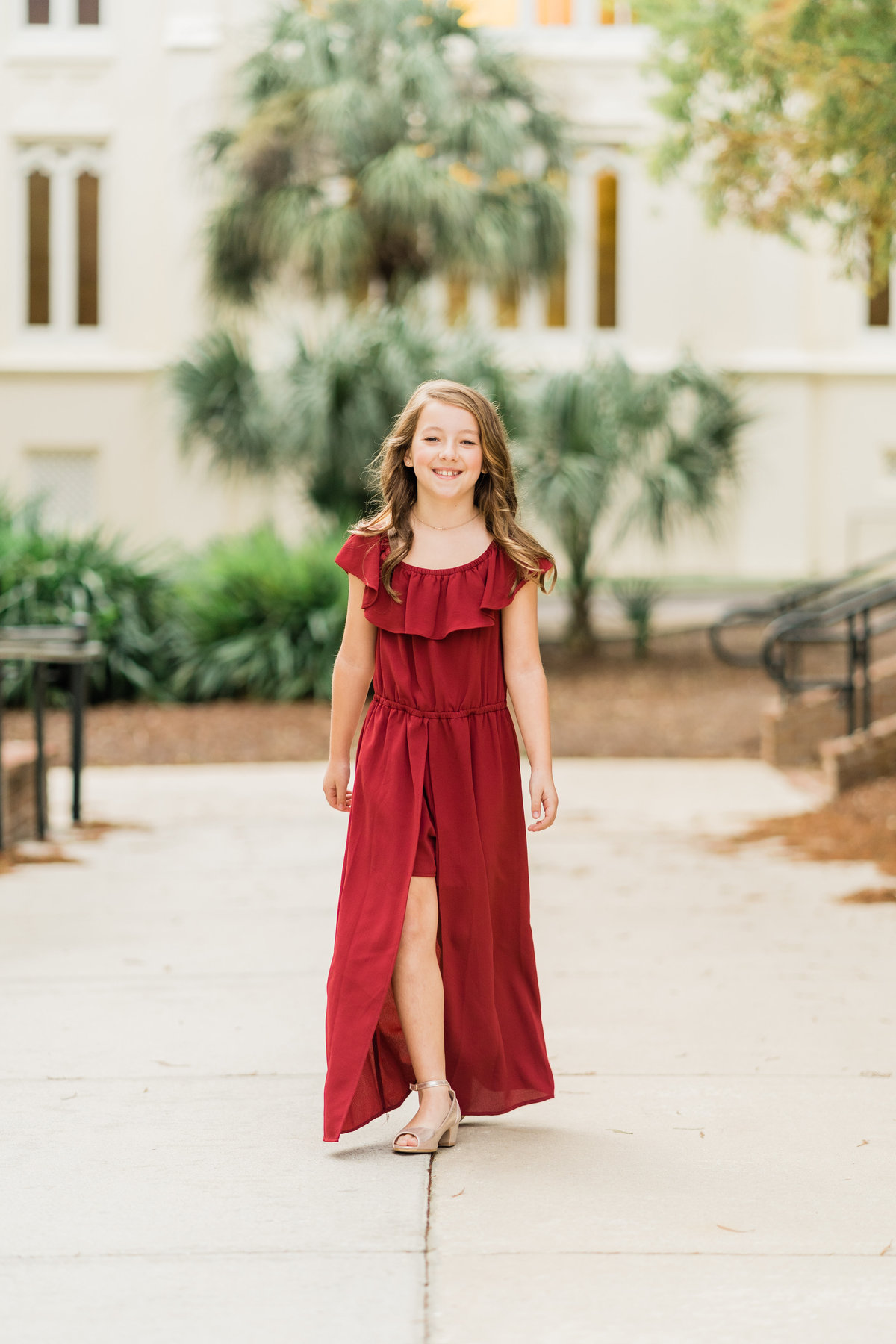 Girl in red dress in park in Alabama