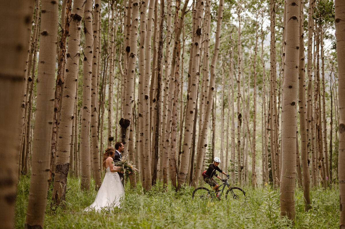 Elopement in an aspen grove with mountain biker in Crested Butte