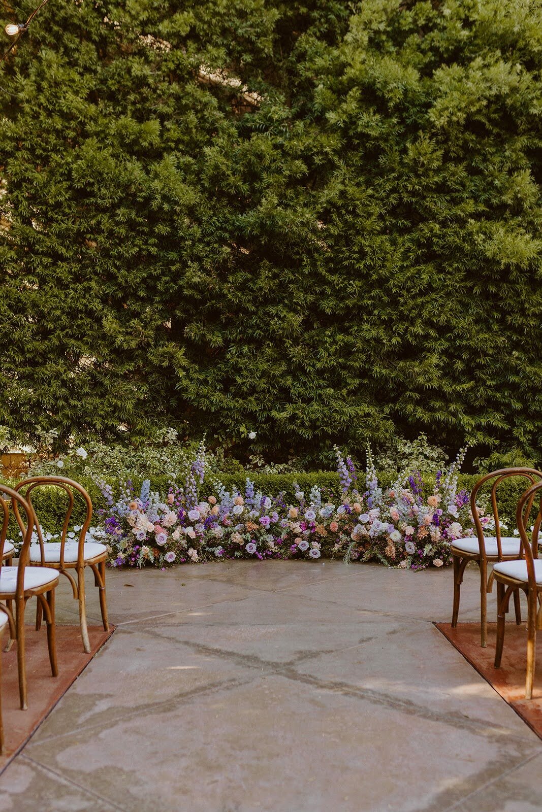 Ground florals in a wedding ceremony space