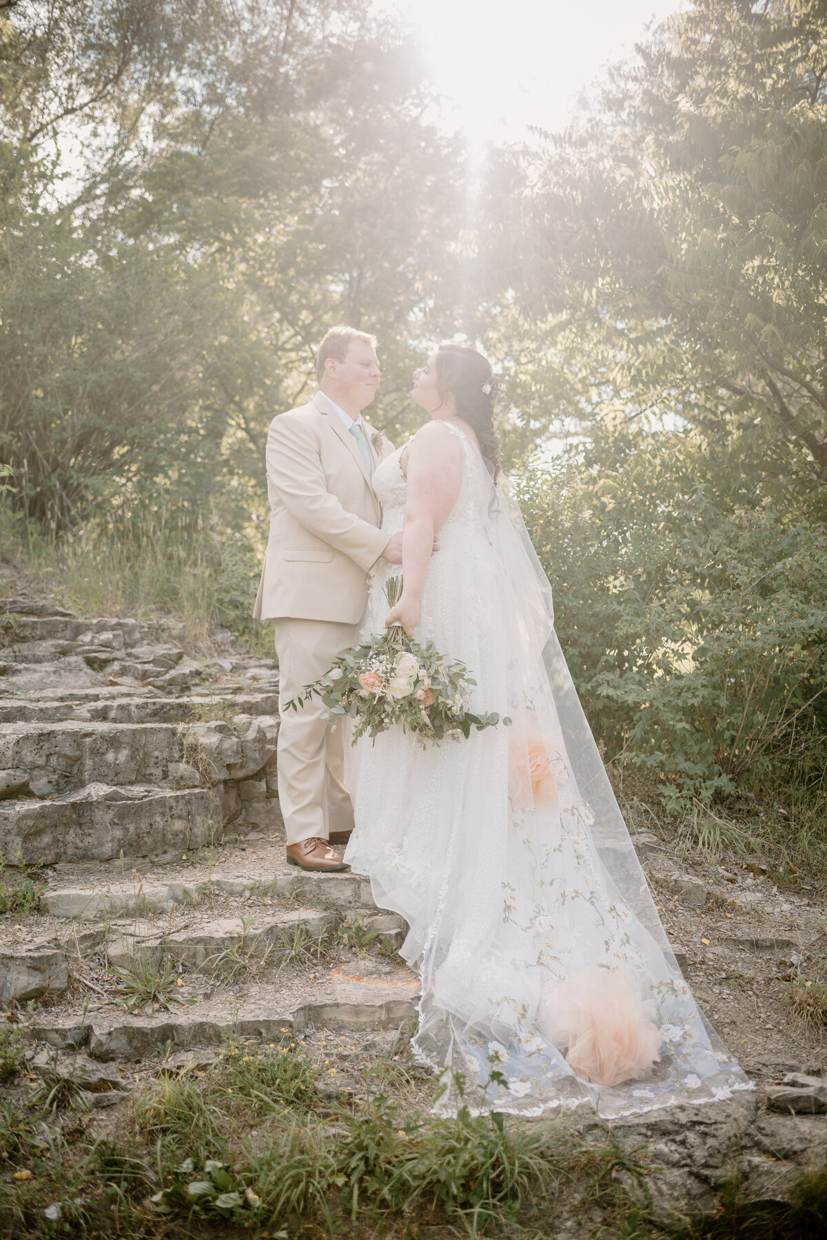 a sunlit moment with the bride and groom