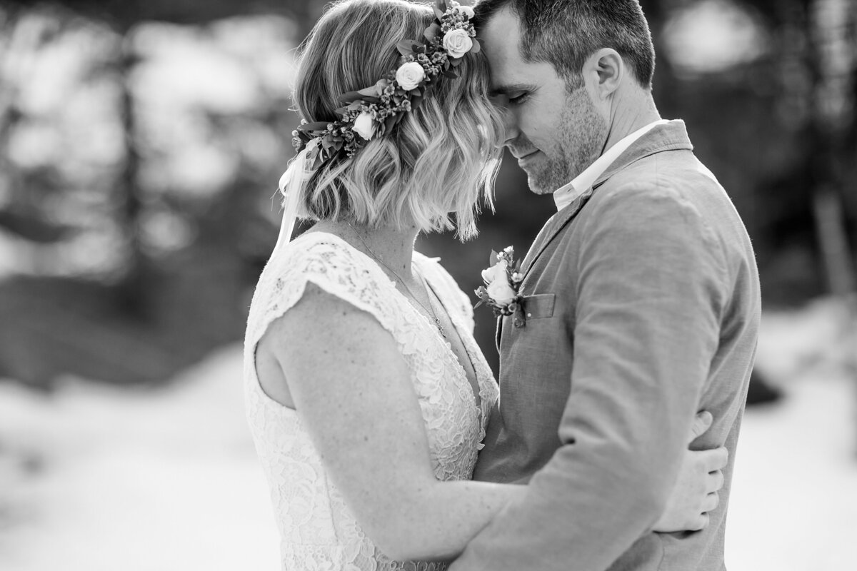 couple embracing on winter elopement day