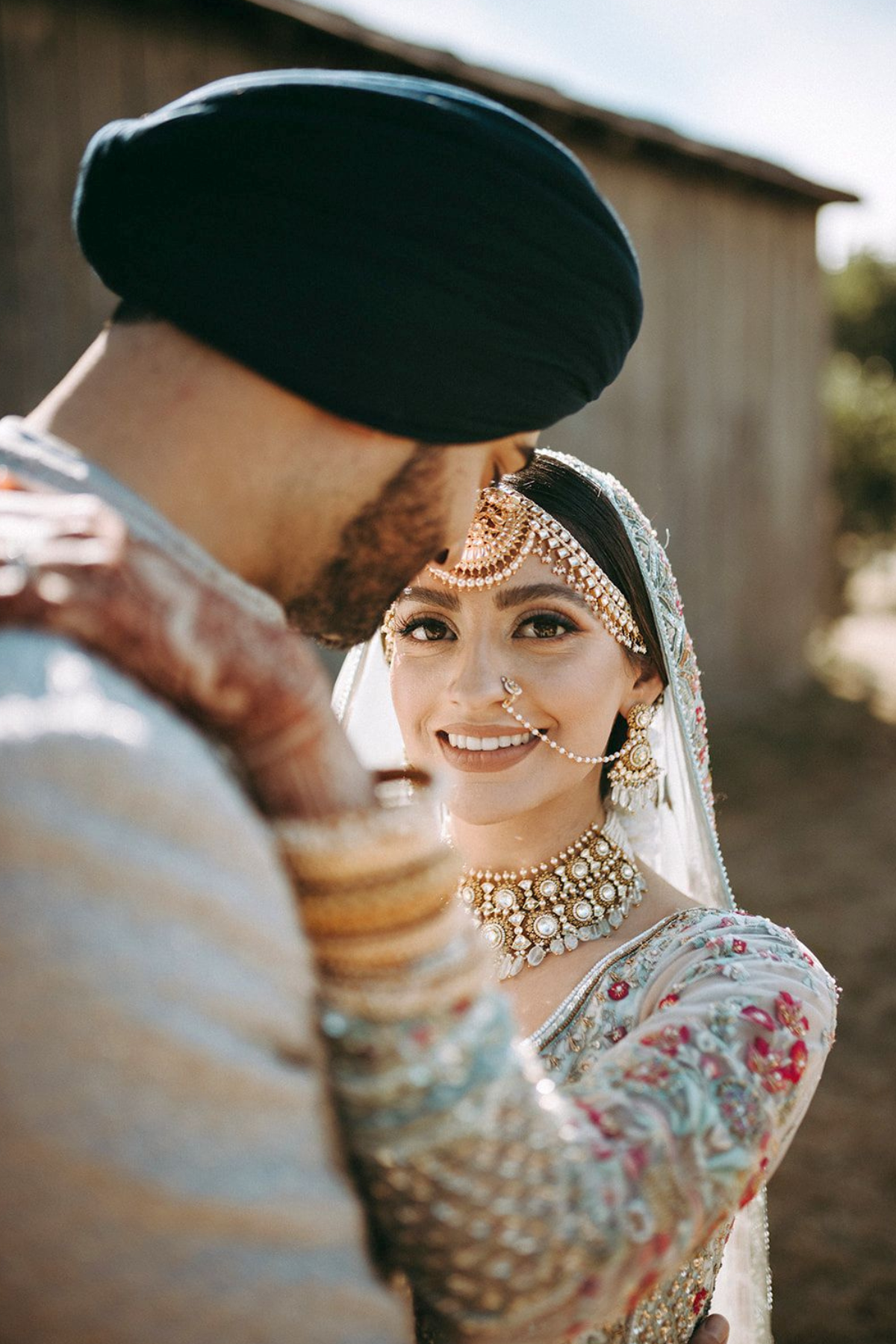 sikh-wedding-ceremony-bride-blue-pink-sharara