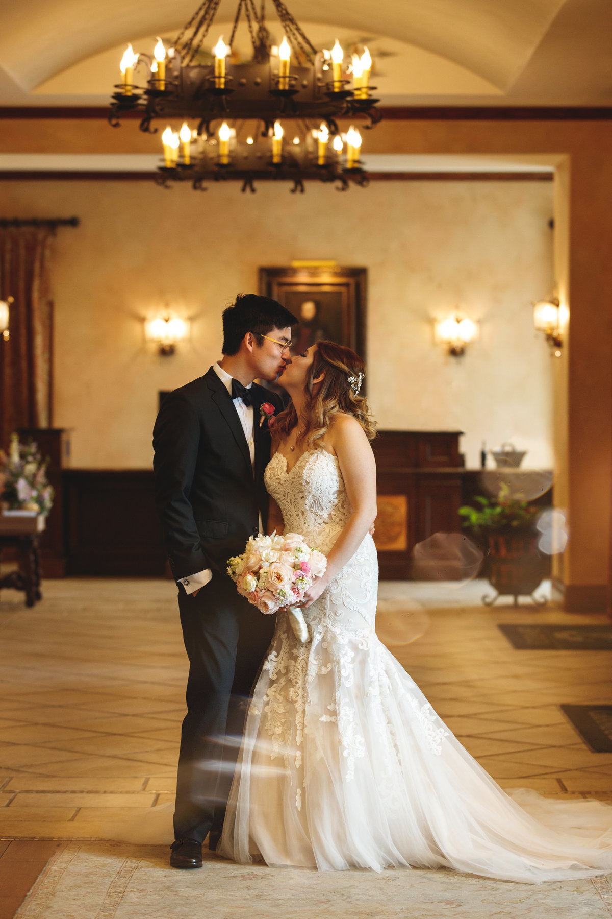 hotel granduca wedding photographer bride groom kiss asian vietnamese lobby 320 S Capital of Texas Hwy, West Lake Hills, TX 78746