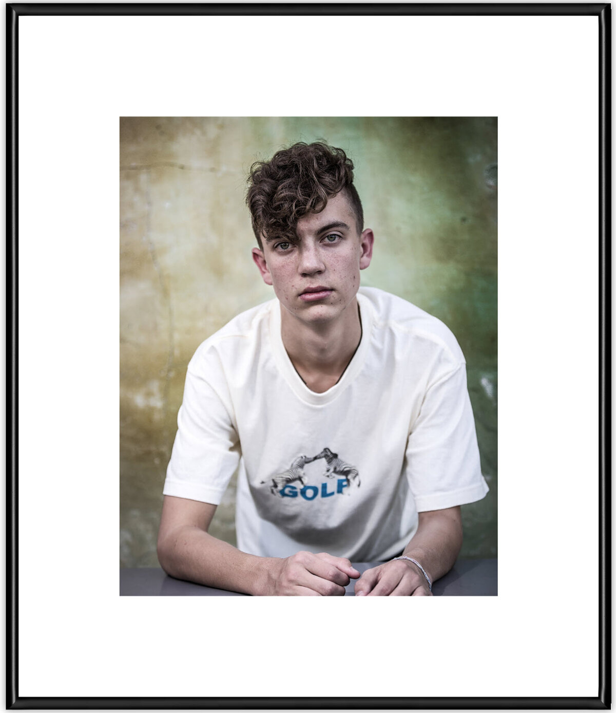 Senior Lachlan nails the look, mounted in a Soho Black frame with White Mat