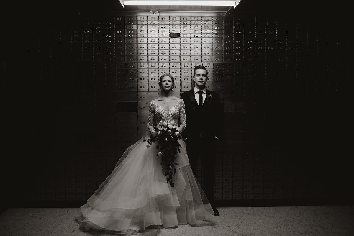 bride and groom in the vault at the teasury venue