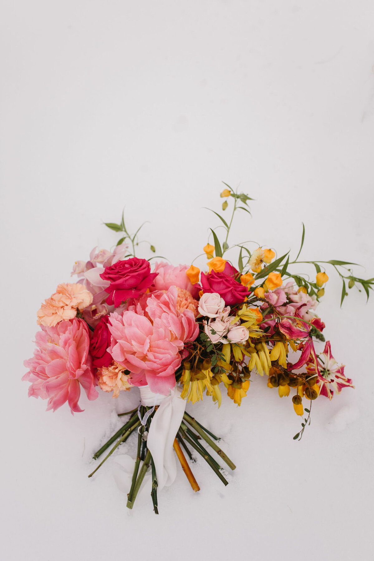 The Vase Floral Co - unique bridal bouquet in bright pink, red and yellow