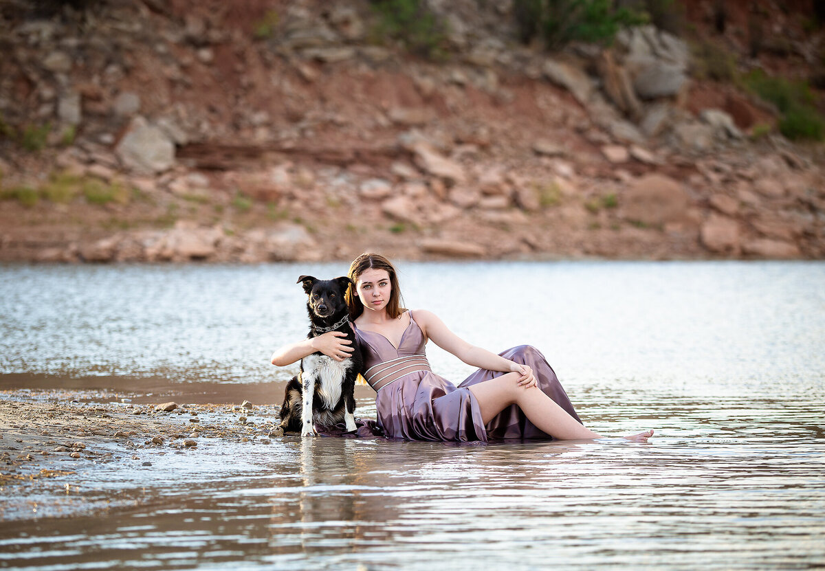 Girl in dress with dog in Lake at lake mackenzie