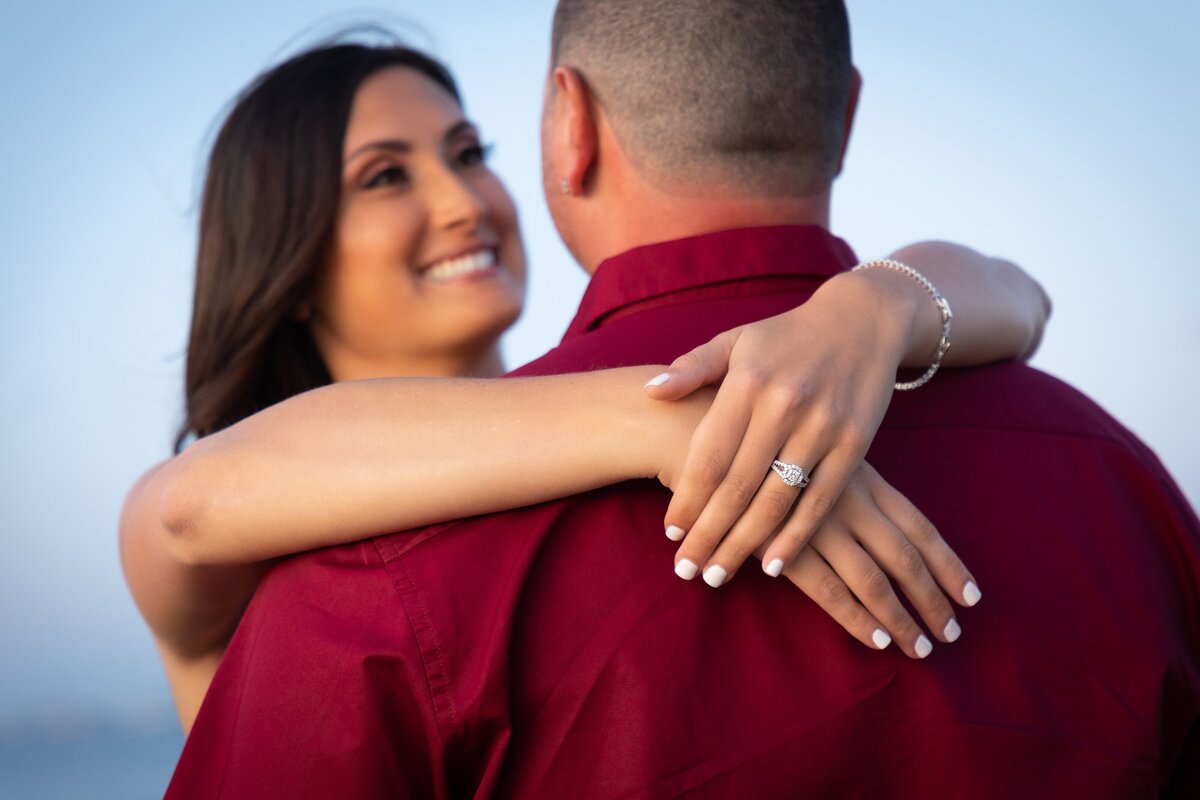 engagement-ring-detail-hands-hug