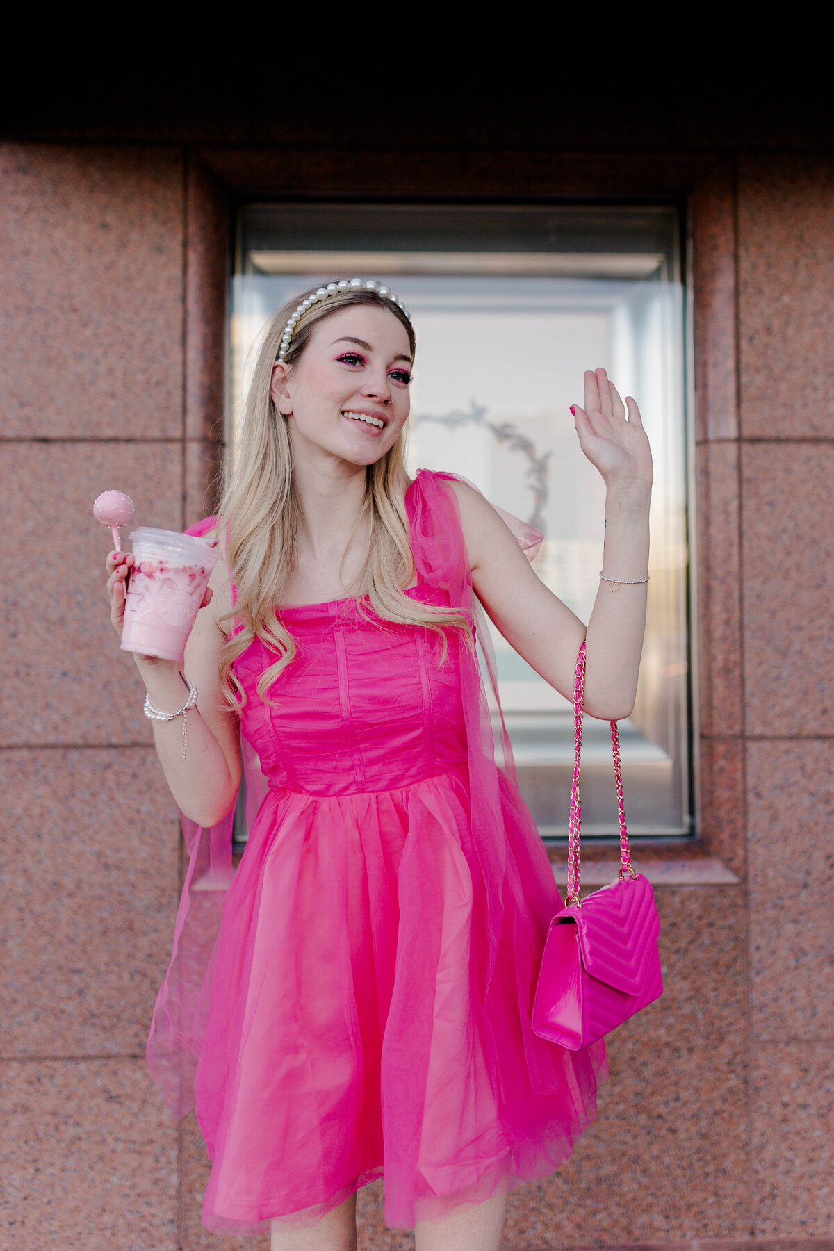 Model poses like the barbie movie and says hi barbie while wearing all pink in front of houston galleria tiffanys