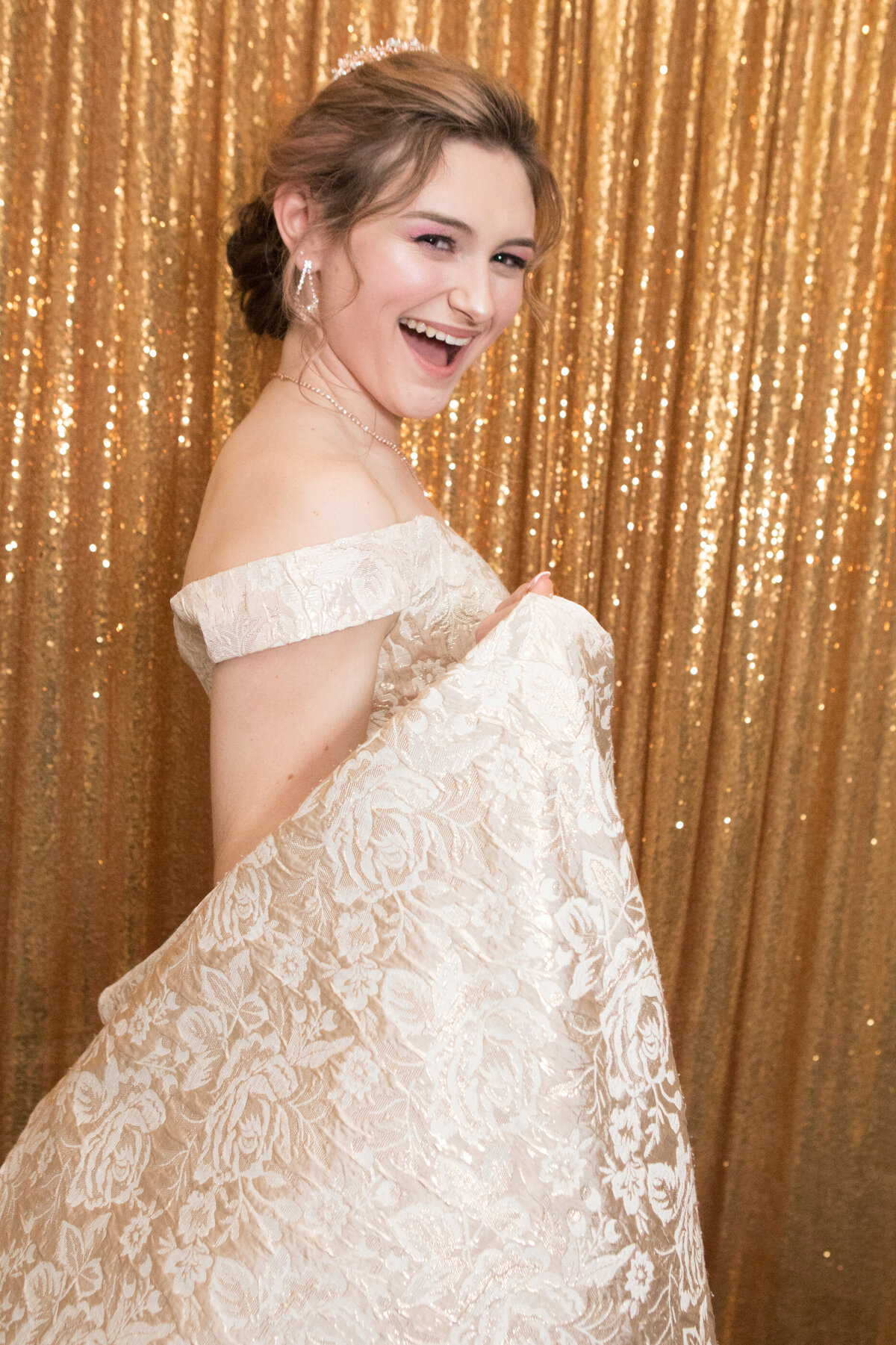 teenage girl golden brocade gown smiles and poses in front of gold sequin background  Oakland New Jersey Portobello's Sweet 16 Photographer Milestone images