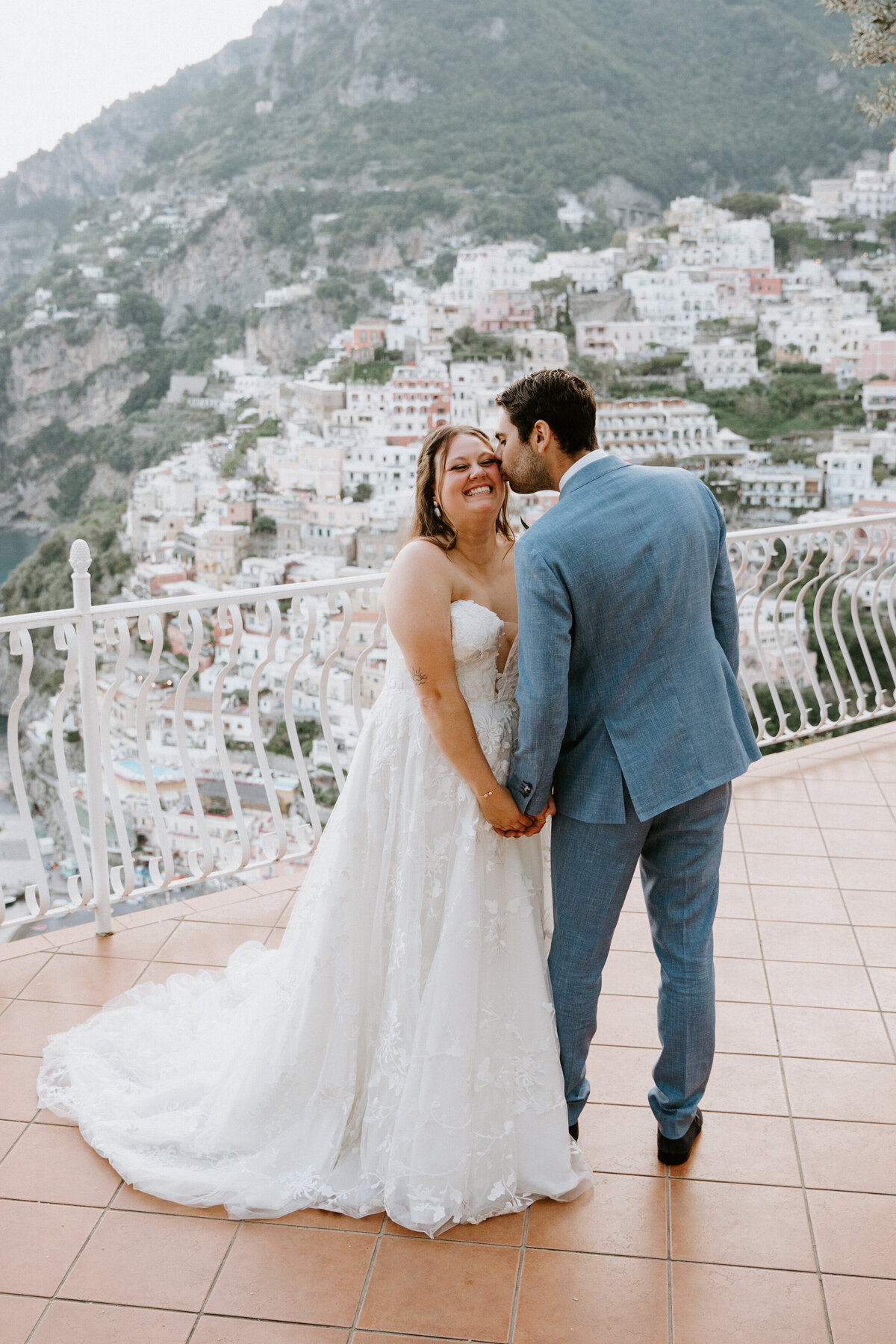 Married couple on balcony of Villa Oliviero in Positano, Amalfi Coast, Italy