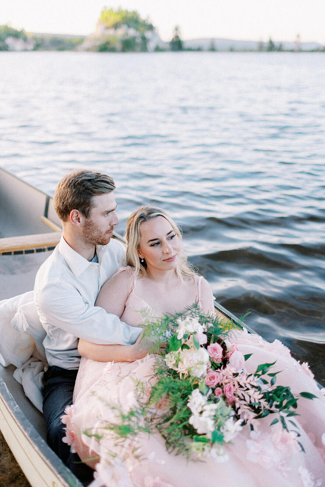 groom-and-bride-in-small-boat