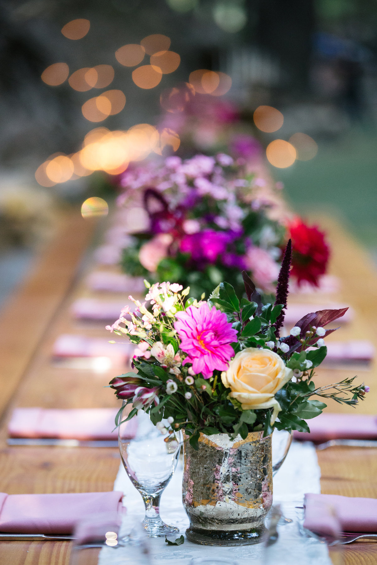 boho wedding flowers in mercury glass vase