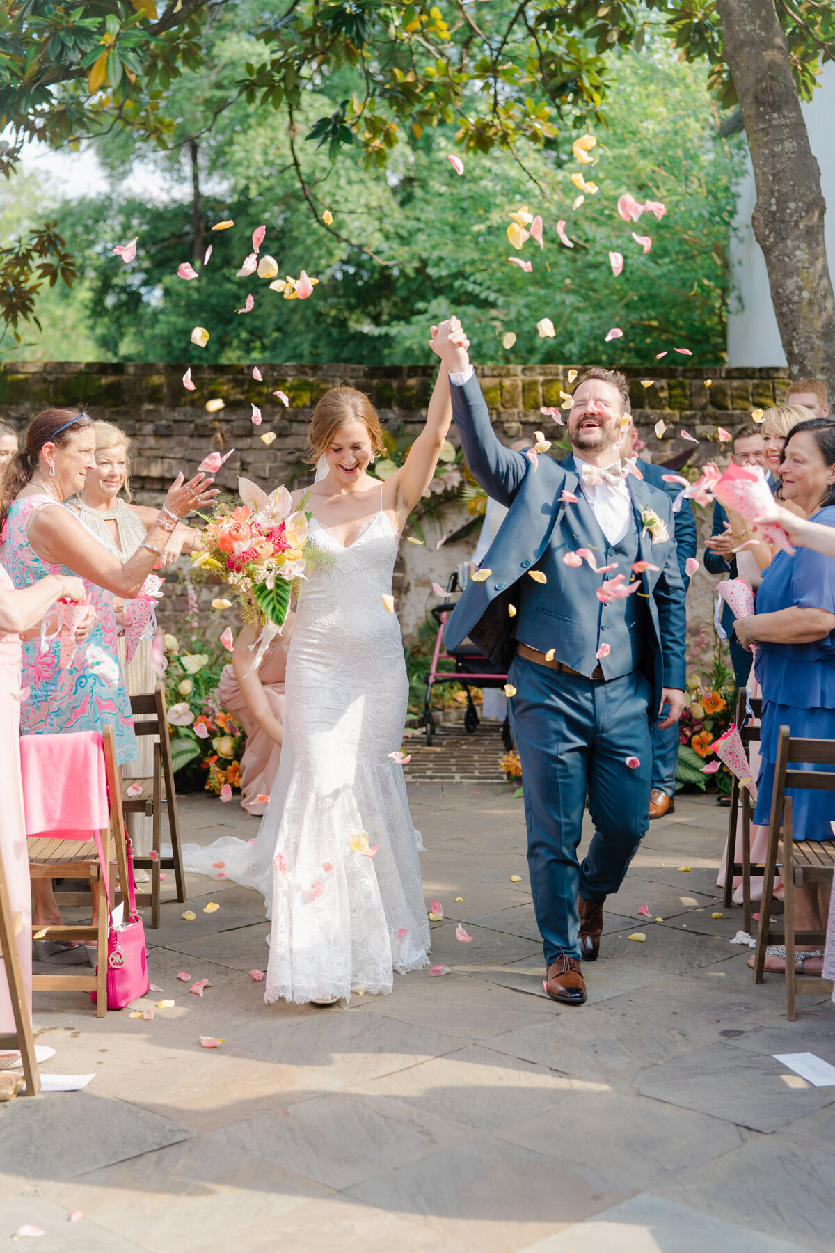 Spring Gadsden House wedding ceremony exit petal toss. Colorful flower petals.