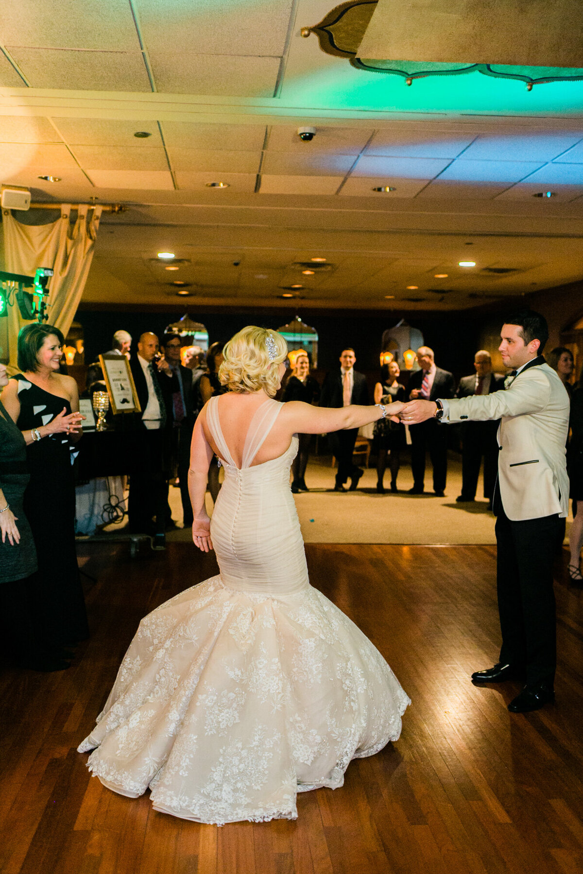 A couple shares their first dance at their wedding reception in Chicago