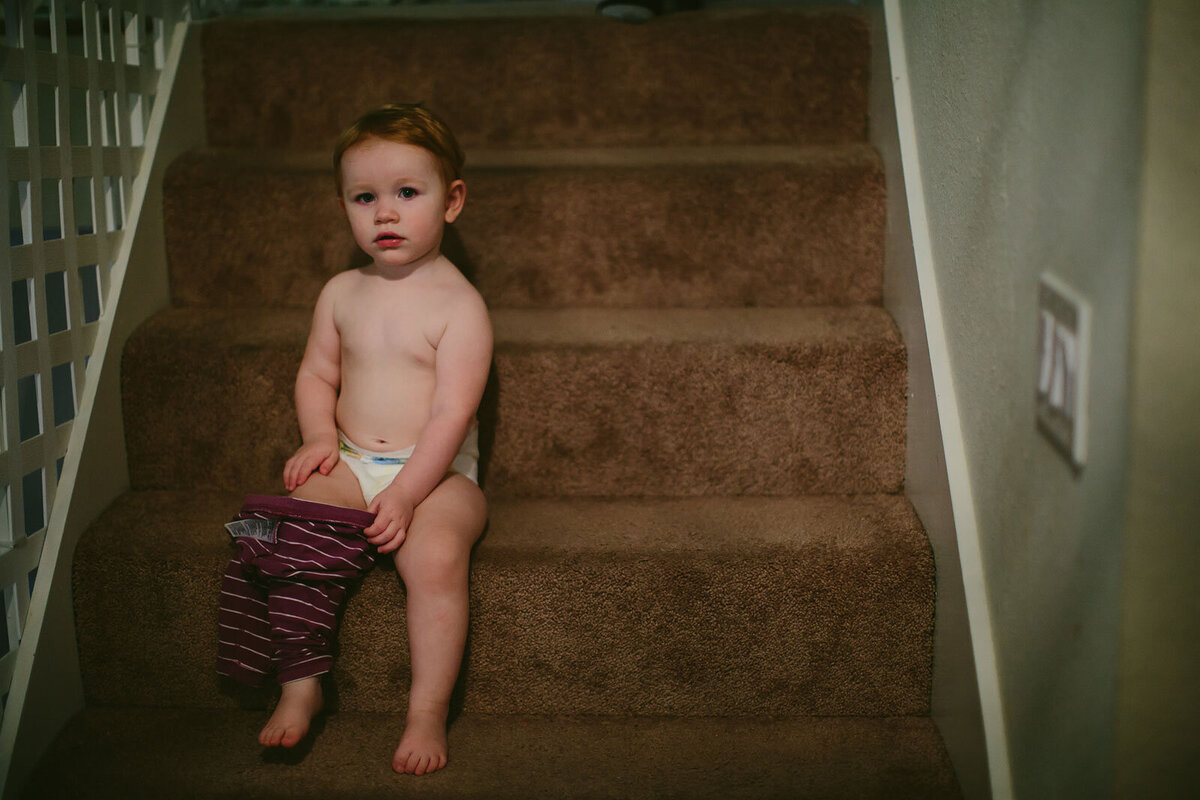 Documentary-Family-Photographer-Day-in-the-Life-Baby-Diaper-Stairs