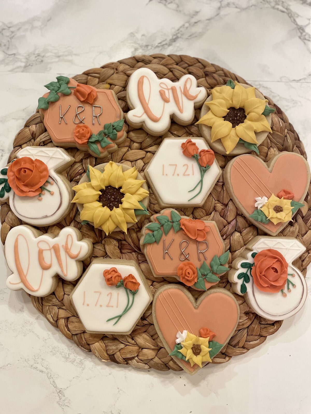 Custom-designed sugar cookies with intricate icing details, perfect for birthdays, made in Gilbert.
