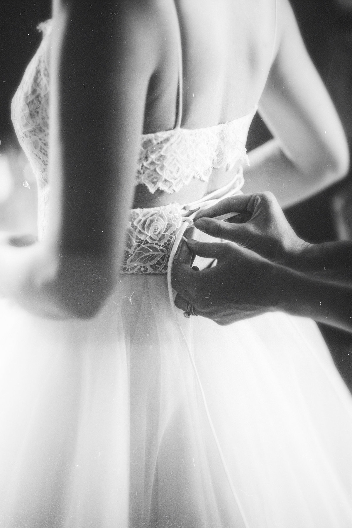 Bride Tying Dress Photography