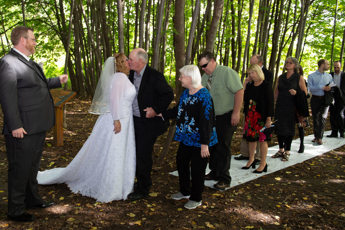 receiving line at wedding in the woods