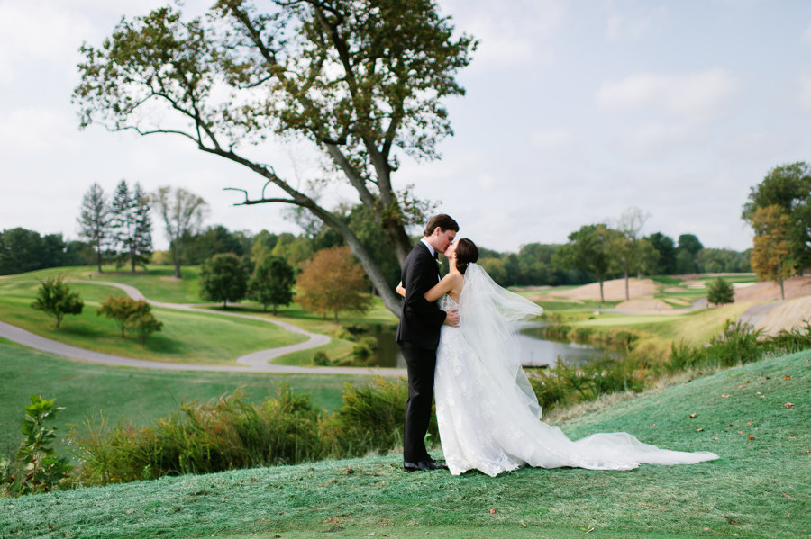 Bride-Groom-Kissing-Golf-Course-Congressional-Country-Club.